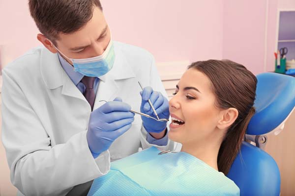 How A Restorative Dentist Can Improve Your Oral Health